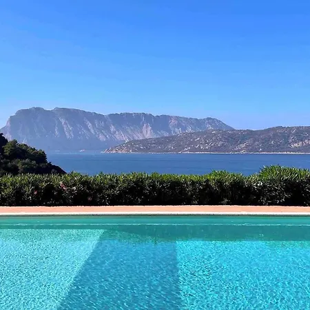 Апартаменты Punta Est Monolocale Vista Mare Капо-Кода-Кавальо